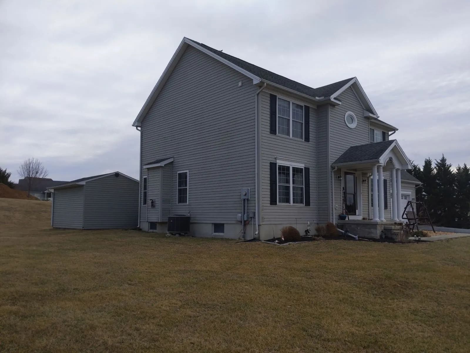 Roof, Siding, Windows, & Roof Over Deck, Martinsburg: before renovation